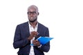 Portrait of a young bearded businessman holding a folder, thoughtful Royalty Free Stock Photo