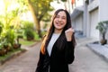 Portrait of Young beautiful Asian business woman felling happy or success working