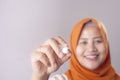 Muslim Woman Writing on Virtual Screen Royalty Free Stock Photo