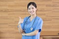 Portrait Young beautiful asian successful female doctor or nurse with stethoscope Royalty Free Stock Photo