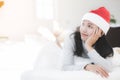 Portrait of young beautiful asian woman with christmas present . Royalty Free Stock Photo