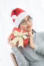 Portrait of young beautiful asian woman with christmas present . Royalty Free Stock Photo