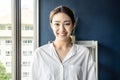 Portrait of young beautiful asian woman relax face in bedroom. Sexy beauty girl with healthy makeup facial treatment perfect glow Royalty Free Stock Photo