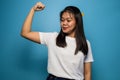 Portrait of Young beautiful asian women wearing white T-shirt with blue  background Royalty Free Stock Photo