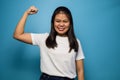 Portrait of Young beautiful asian women wearing white T-shirt with blue  background Royalty Free Stock Photo