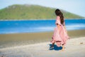 Portrait young beautiful asian woman walk smile and happy on the beach sea and ocean Royalty Free Stock Photo