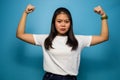 Portrait of Young beautiful asian women wearing white T-shirt with blue  background Royalty Free Stock Photo