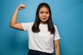 Portrait of Young beautiful asian women wearing white T-shirt with blue  background Royalty Free Stock Photo