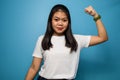 Portrait of Young beautiful asian women wearing white T-shirt with blue  background Royalty Free Stock Photo