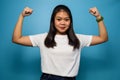 Portrait of Young beautiful asian women wearing white T-shirt with blue  background Royalty Free Stock Photo