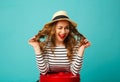 Portrait of young beautiful blond woman in hat with flirting exp Royalty Free Stock Photo