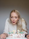 Portrait of a young beautiful blonde girl on birthday Royalty Free Stock Photo