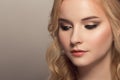 young beautiful blonde woman. Hairstyle and make-up.