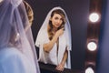 Portrait of the young beautiful bride mirror. Royalty Free Stock Photo