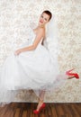 Portrait of young beautiful bride in shoes Royalty Free Stock Photo