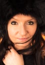 Portrait of young beautiful brunette woman wearing furry hat. Soft skin winter beauty fashion Royalty Free Stock Photo