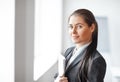 Portrait of young beautiful business woman with documents in the Royalty Free Stock Photo