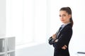 Portrait of young beautiful business woman in the office Royalty Free Stock Photo