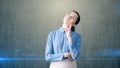 Portrait of young beautiful business woman thinking about something and looking up Royalty Free Stock Photo