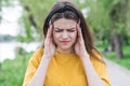 Portrait of a young and beautiful caucasian girl who has a headache. Royalty Free Stock Photo