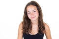 Portrait of young beautiful caucasian teen girl in black shirt smiling looking camera isolated on white background Royalty Free Stock Photo