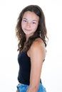 Portrait of young beautiful caucasian teenage girl in black t-shirt cheerfull smiling looking at camera in studio photo isolated Royalty Free Stock Photo