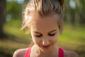 portrait of a young beautiful Caucasian woman smiling and looking down Royalty Free Stock Photo