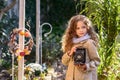 Little girl with old retro photography camera in hands outdoors Royalty Free Stock Photo