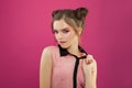 Portrait of young beautiful fashion model woman on bright pink background Royalty Free Stock Photo