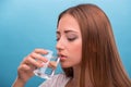 Portrait of young beautiful girl drinking clean Royalty Free Stock Photo