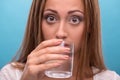 Portrait of young beautiful girl drinking clean Royalty Free Stock Photo