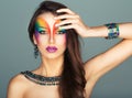 Portrait of a young beautiful girl with a fashion bright multicolored makeup Royalty Free Stock Photo