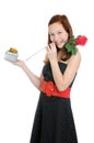 Portrait of a young and beautiful girl with gift and rose isolated on the white background