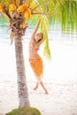 Portrait young beautiful girl relaxing on beach. Smiling woman spending chill time outdoor Bali island. Summer Season Royalty Free Stock Photo
