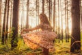 Portrait of young beautiful girl in summer dress in forest that dancing Royalty Free Stock Photo