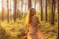 Portrait of young beautiful girl in summer dress in forest that dancing Royalty Free Stock Photo