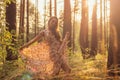 Portrait of young beautiful girl in summer dress in forest that dancing Royalty Free Stock Photo