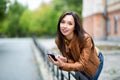 Portrait of a young beautiful girl in the urban landscape Royalty Free Stock Photo