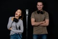 Portrait of young and beautiful and handsome male singers working together in voice recording studio with fun and happiness, they Royalty Free Stock Photo