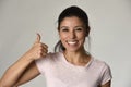 Portrait of young beautiful and happy Latin woman with big toothy smile excited and cheerful