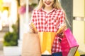 Portrait of young happy smiling woman with shopping bags. Close-Up Royalty Free Stock Photo