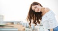 Portrait of young beautiful innocence asian woman in sky roof top. Royalty Free Stock Photo