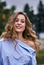 Portrait of a young beautiful laughing woman with brown hair and brown eyes. Royalty Free Stock Photo