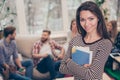 Portrait of young beautiful manager woman holding notes