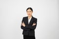 Young motivated businesswoman standing with her arms crossed with white isolated background Royalty Free Stock Photo