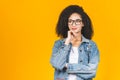 Portrait of beautiful positive african american curly woman standing with arms crossed Royalty Free Stock Photo