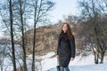 Portrait of a young beautiful red hair european girl looking up in the forest Royalty Free Stock Photo