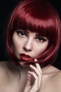 Young beautiful red-haired girl with bob haircut and Royalty Free Stock Photo