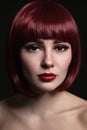 Young beautiful red-haired girl with bob haircut and Royalty Free Stock Photo
