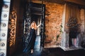 Portrait of young beautiful red-haired girl in the image of a Gothic witch on Halloween Royalty Free Stock Photo